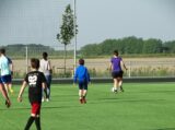 Laatste training S.K.N.W.K. JO11-1JM van seizoen 2022-2023 (partijtje tegen de ouders) (115/221)